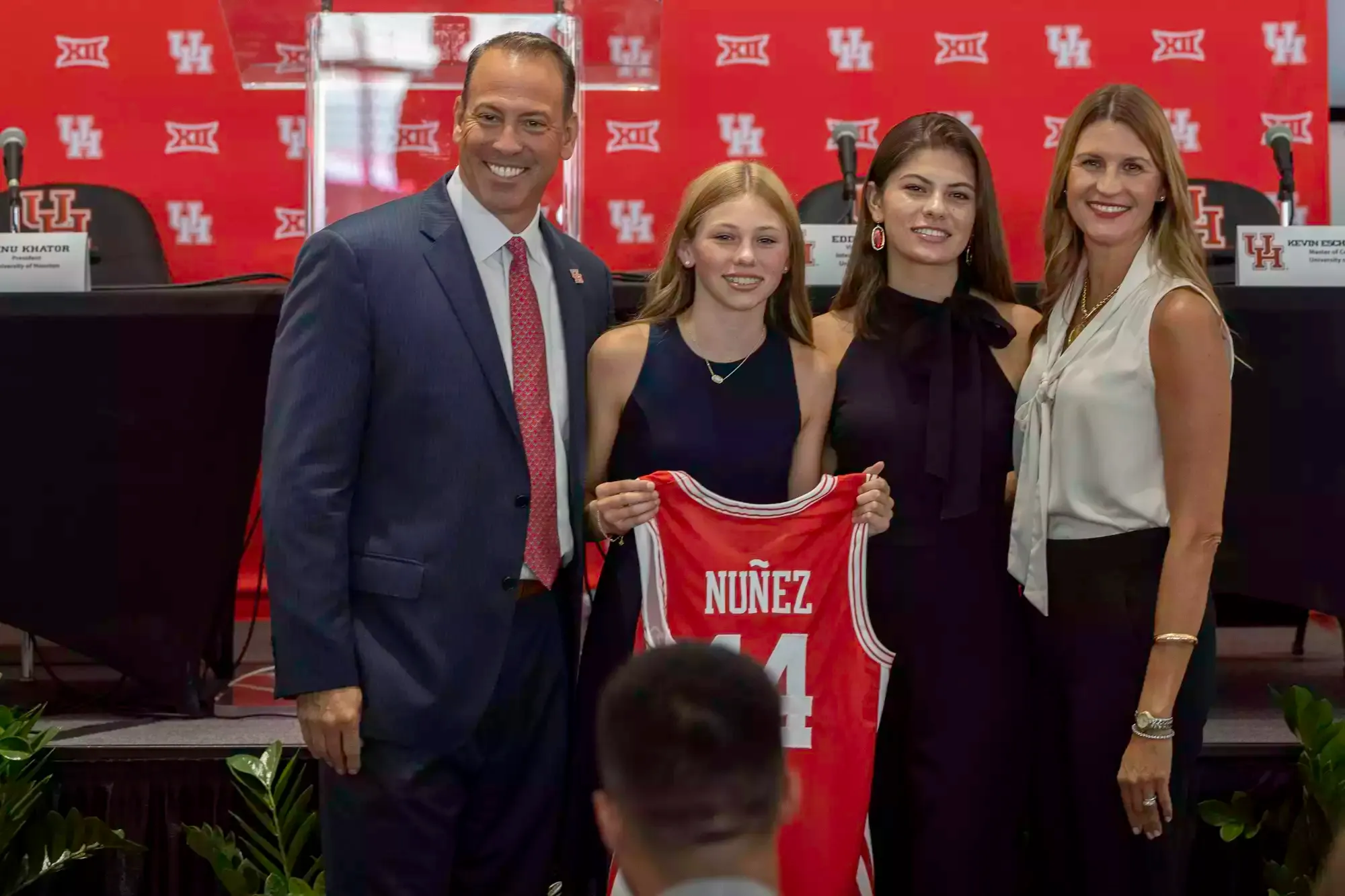 Eddie Nuñez poses with his family at his press conference